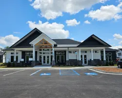 a building with a parking lot