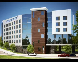 a large building with cars parked in front of it