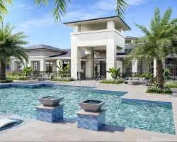 a swimming pool in front of a building