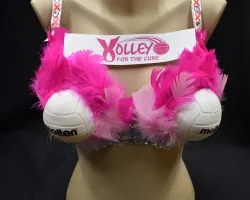 a pink and white stuffed animal