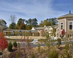 a house with trees in the background