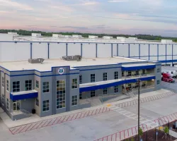 a airplane that is parked on the side of a building