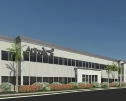 a building with palm trees