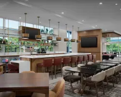 Homewood Suites & Tru by Hilton Custom Bar Millwork & Quartz Countertops and Millwork Feature Wall
