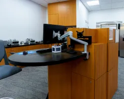 an office with a computer and a chair