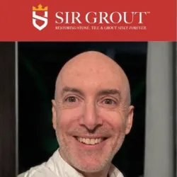 Smiling bald man in white shirt with Sir Grout logo and Atlanta partner info on a red and white background