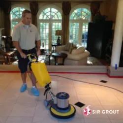 Sir Grout Man Cleaning Grout