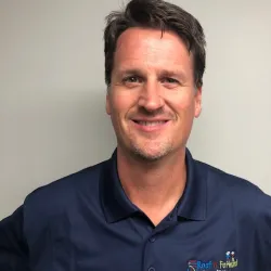 a man in a blue shirt