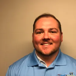 a man wearing a blue shirt