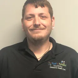 a man smiling for the camera