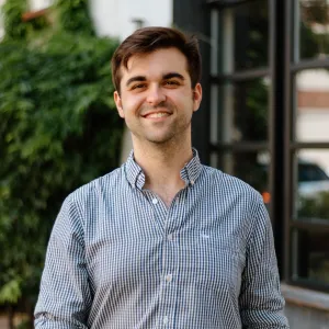 a man smiling for the camera.