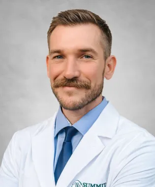 A portrait of Joshua Adams, FNP.