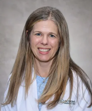 A portrait of Heather Cash, MD.