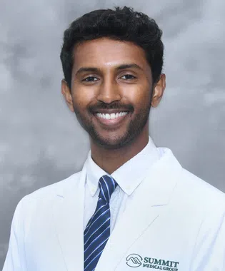 A portrait of Kevin Gurrala, DO.