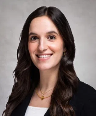 A portrait of Rojeda Merani, DNP, APRN, FNP-BC.