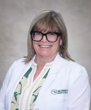 A portrait of Susan Roberts, MD.