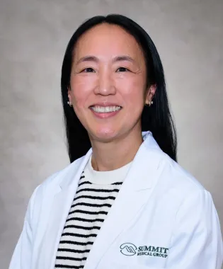 A portrait of Susan, Scott, MD.