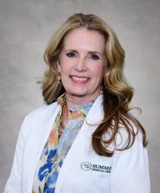 A portrait of Angela Smithey, MD.