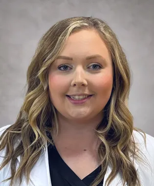 A portrait of Amber Cook, APRN, FNP-BC.