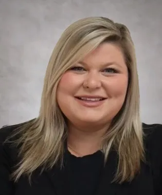 A portrait of Courtney Beeler, FNP.