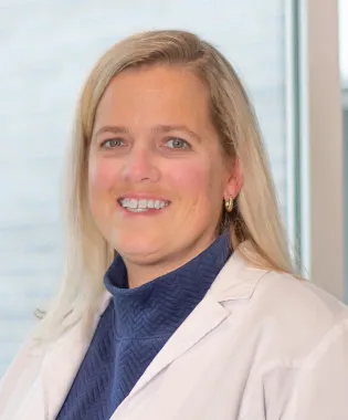 A portrait of Gina McNeer, ACNP-BC.