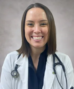 a woman wearing a stethoscope around her neck.