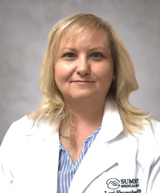 A portrait of Lori Shumaker, FNP.