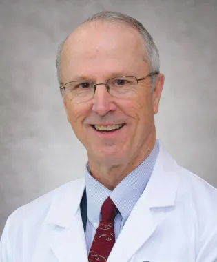 A portrait of Andrew L. Smith, MD.