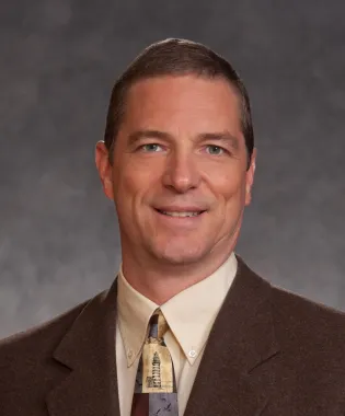 a man wearing a suit and tie.