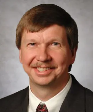 A portrait of Kenneth C. Reese, MD.