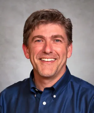 A portrait of Rodney E. Sturgeon, MD.