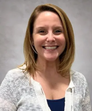 A portrait of Ashley Currier, FNP.