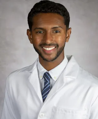 A portrait of Kevin Gurrala, MD.