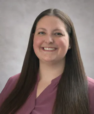 A portrait of Kaitlin King, FNP.