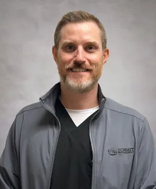 A portrait of Justin Hill, PA.