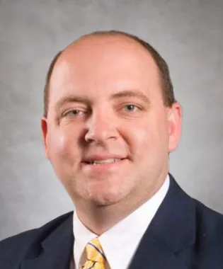 A portrait of Donald W. Parker, MD.