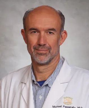 A portrait of Michael J. Passarello, MD.