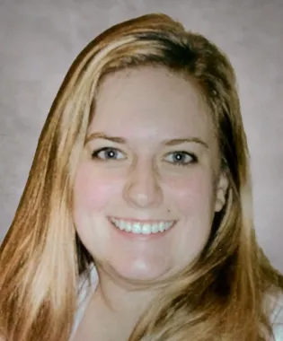 a close-up of Lyndal Davies smiling.