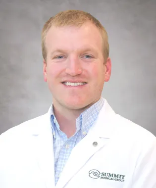 A portrait of Tyler Hall, DO.