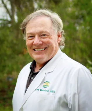 A portrait of Paul H. Wakefield, MD.