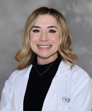 A portrait of Abby Thornton, FNP.