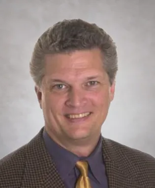 A portrait of Tadhg M. Hart, MD.