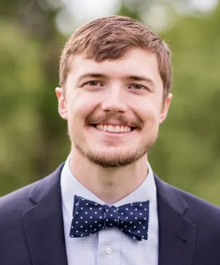 A portrait of Jesse Von Fange, PA-C.