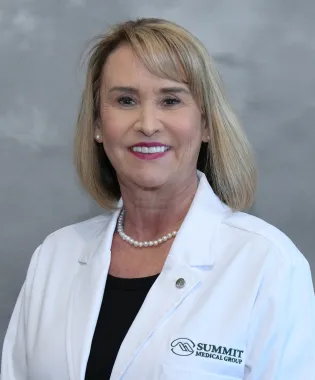 A portrait of Susan Algood, RN, MSN, CPNP.