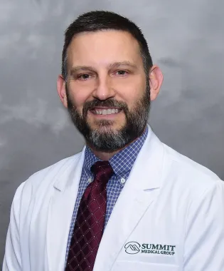 A portrait of Dyron Rector, PA-C.