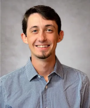 A portrait of Justin Saylor, PA.