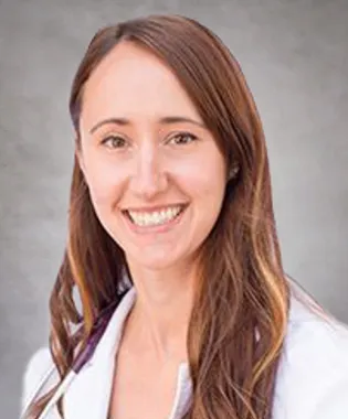 a close-up of a woman smiling.