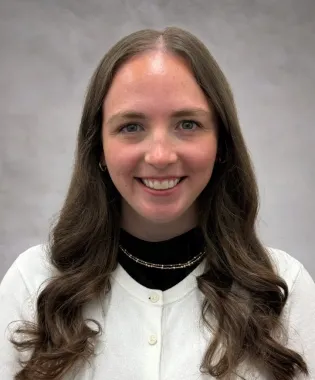 A portrait of Madison Woodard, PA-C.