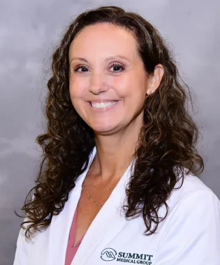 A portrait of MariBeth Follmer, FNP.