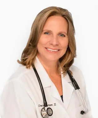 a woman wearing a white coat.